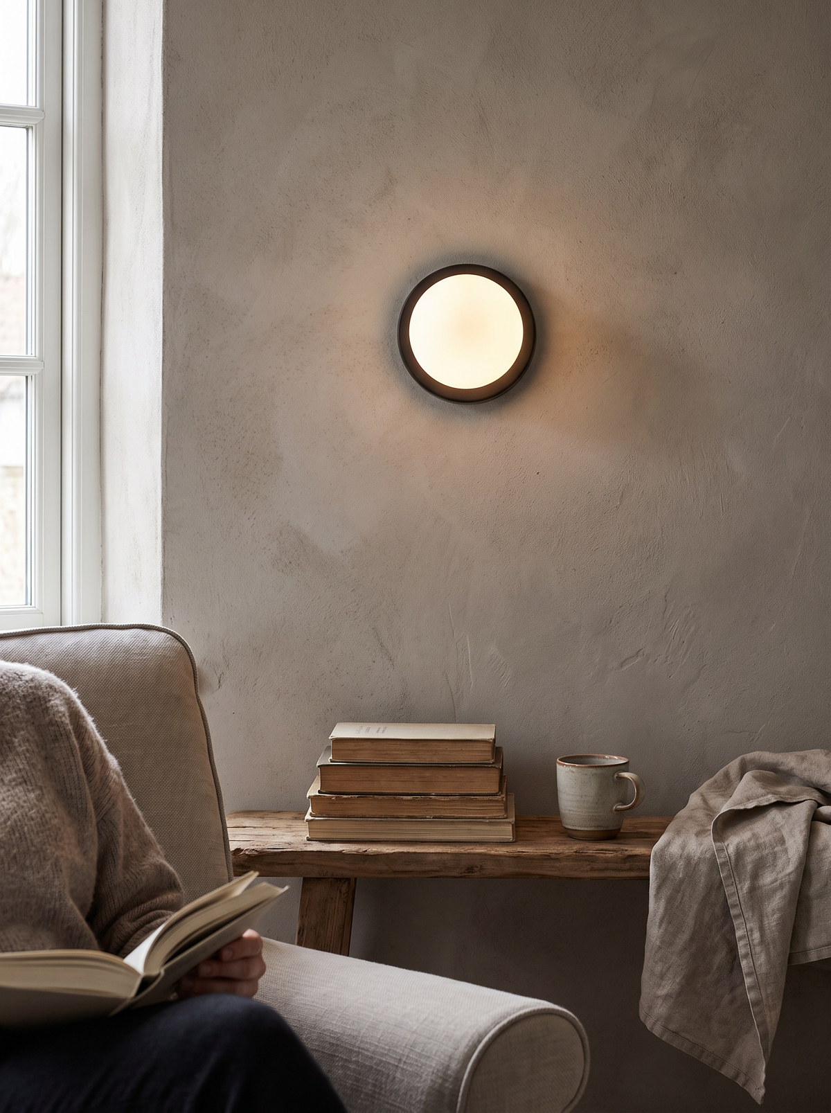 Glass globe indoor wall sconce lit