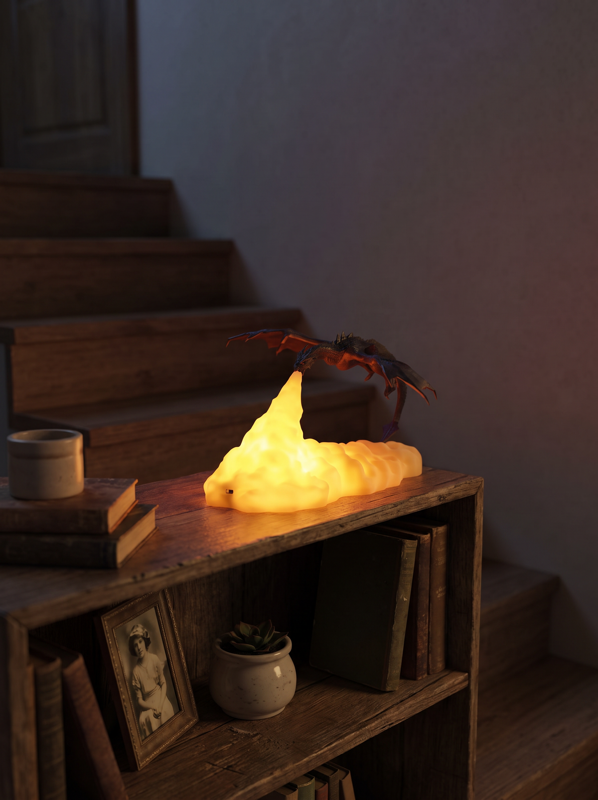 Decorative night light glowing low on a landing shelf