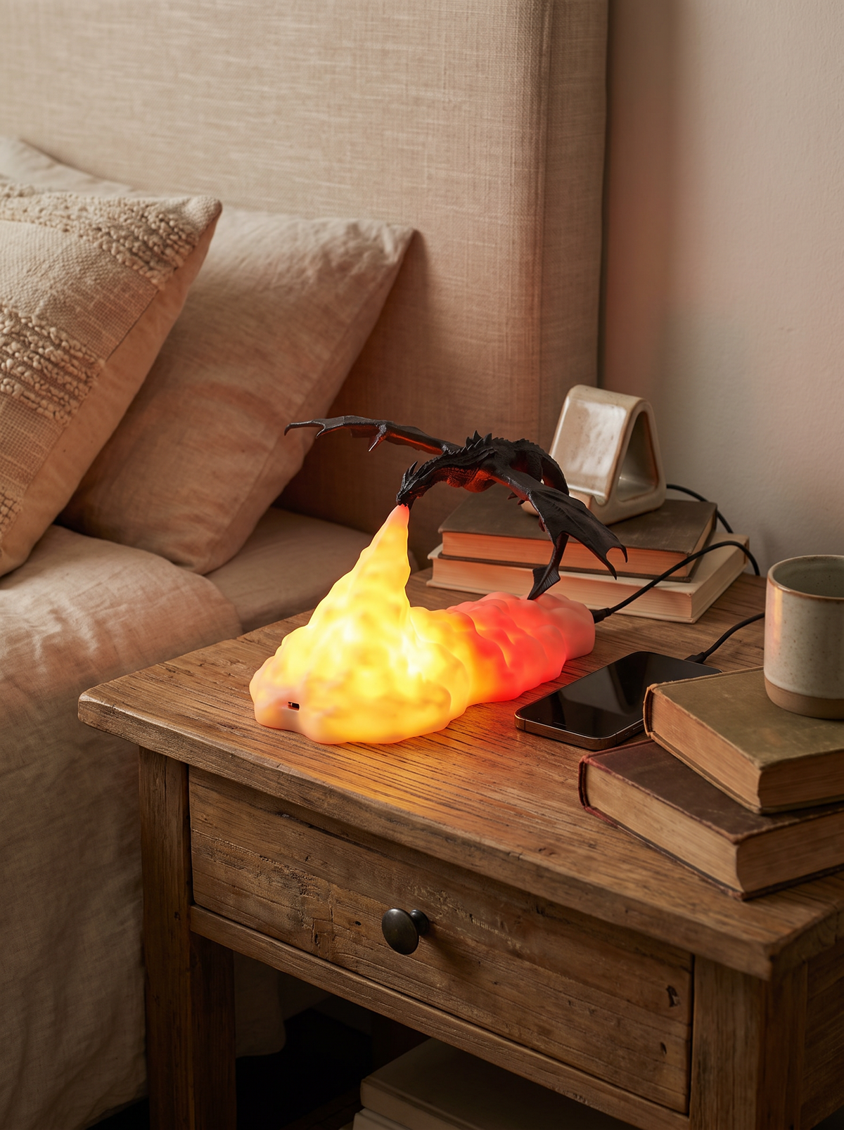 Night light on a bedside table with cable routed away